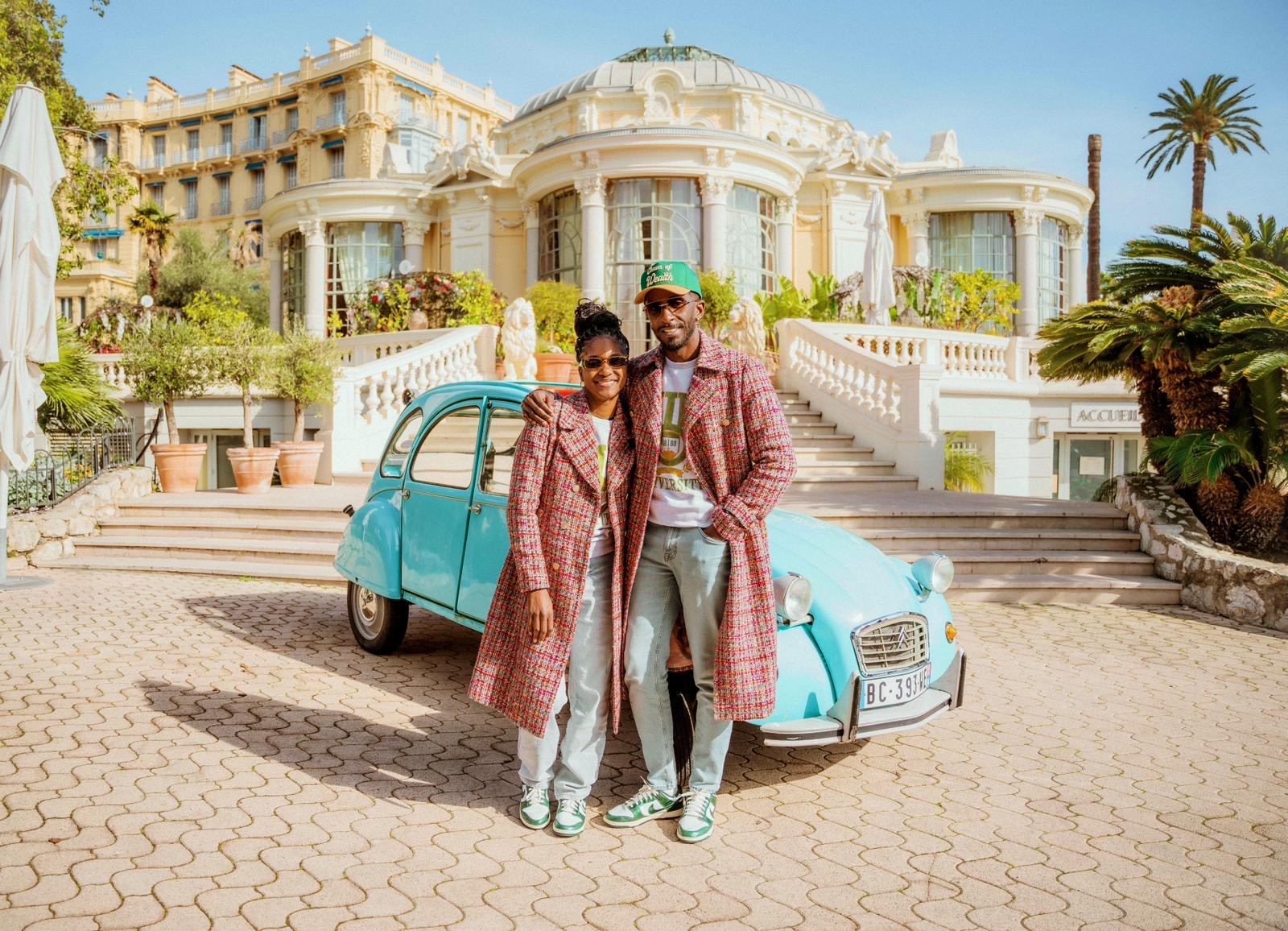 Couple standing in front of 2CV Circé Restaurant French Riviera