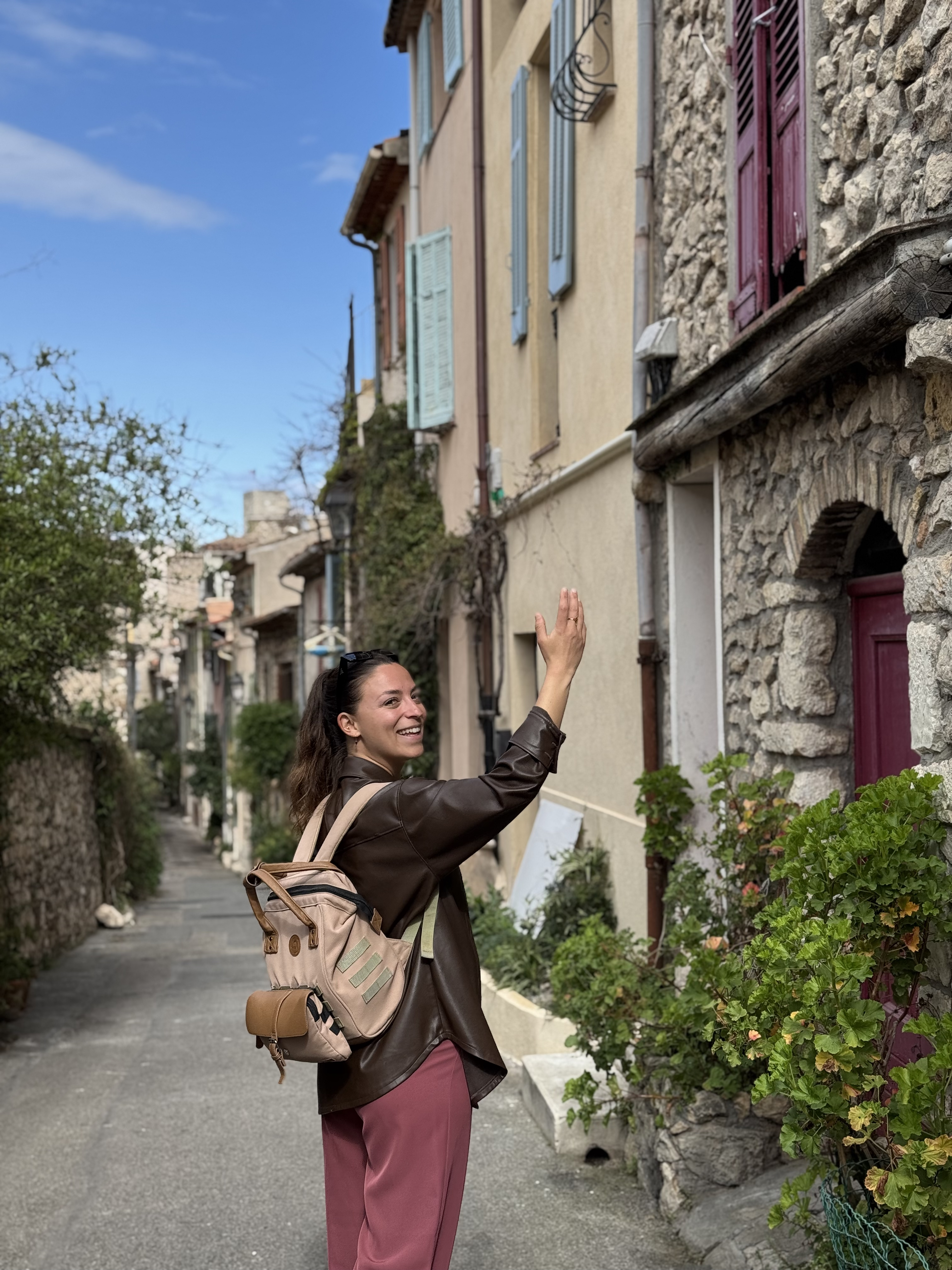 Ysa Tour guide walking in quaint streets of Old Town Antibes